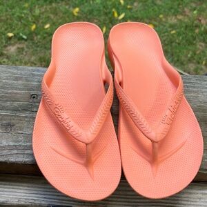 Archie’s arch support flip flops.  Great for foot problems